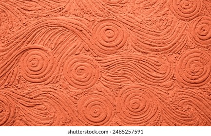 Artistic swirling patterns engraved in red clay texture, intricate circular designs on natural surface for abstract background, creative spiral imprints on earthy material for graphic design element - Powered by Shutterstock