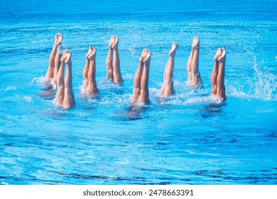 Artistic or synchronized swimming sport - Powered by Shutterstock