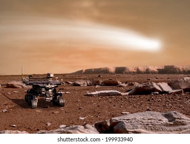 An Artist's Depiction Of The Close Pass Of Comet C/2013 A1 Over The Martian Landscape.  It Is Scheduled To Pass By Mars In October Of 2014. Rover Image Courtesy Of NASA.