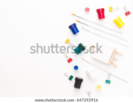 Artist's desk and workspace. Creative process, art workshop details with copyspace. Flat lay 