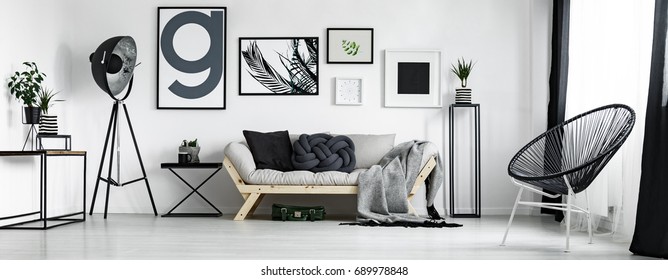 Artist's Living Room In Minimal Style With Artworks 