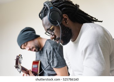 Artists Producing Music In Their Home Sound Studio.