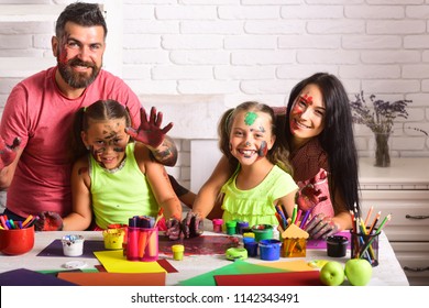 Arts And Crafts. Girls Painters Painting With Mother And Father. Entertainment, Cosplay Party And Holiday. Learning And Playing Concept. Happy Family Showing Hands Colored In Paints.