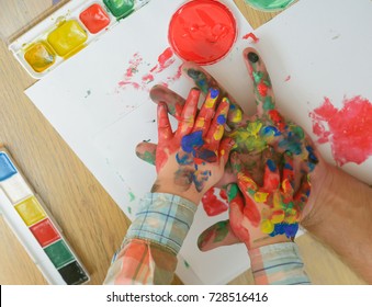 Arts And Crafts. Handprint Painting Concept. Hands And Fingers Drawing With Multicolor Paints On White Paper. Fathers Day, Family Love And Care. Imagination, Creativity And Freedom.