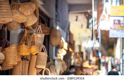 Arts and crafts shop in Changmoi road Thailand. People, foreign and travelers walking travel visit handmade products shopping street for souvenirs local art and craft at Chiangmai city, Thailand.