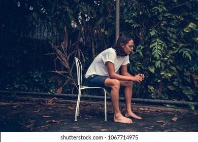 Artsy Man Relaxing Outdoors