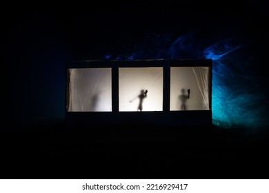 Artwork Decoration. Old House With A Big Windows And Zombies Inside. Blurred Scary Silhouettes At Window. Horror Halloween Concept