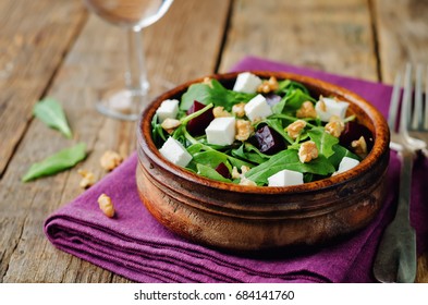 Arugula Beet Goat Cheese Walnuts Salad. Toning. Selective Focus