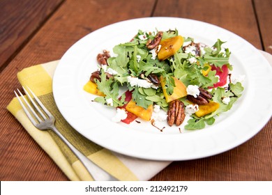 Arugula And Beet Salad With Goat Cheese And Candied Nuts