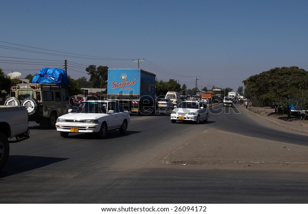 ARUSHA, TANZANIA -
JAN 3: Traffic on a main road from town on January 3, 2009 in
Arusha, Tanzania. Arusha is located 1400 meters above sea-level at
the foot of Mount Meru.