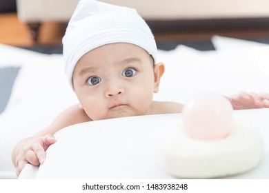 Asain Baby Playing Toy In Living Room And Look At Camera