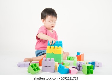 Asain Baby Toddler 2 Years Old Playing Colorful Blocks