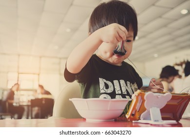 Asain Children Girl Eating