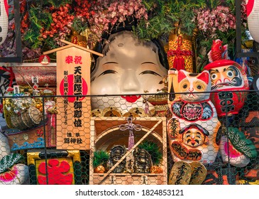 Asakusa, Japan - November 08 2019: Close-up On A Giant Engi Kumade Or Auspicious Rake Decorated With Several Japanese Folklore Deities Celebrating The Enthronement Of The New Emperor Naruhito.