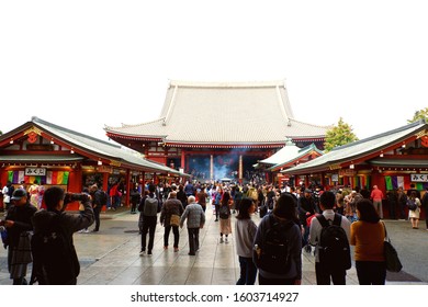 Asakusa, Tokyo, Japan - November 24, 2019: A busy Sunday morning for locals and tourists praying for peace and guidance at the Sensō-ji Temple. 