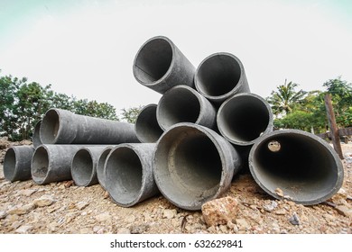 Asbestos Pipe Pile On The Ground In The Construction Area