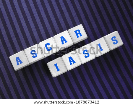 Ascariasis, word cube with background.