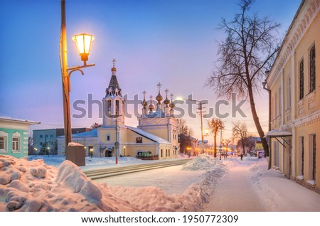Ascension Cathedral on Moskovskaya Street in Murom on a winter snowy pink sunny morning
