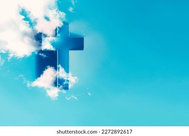Ascension day concept. Christian Easter. Shining cross in clouds on blue sky. Second coming of Christ. Faith in Jesus Christ. Christianity. Church worship, salvation, Easter concept