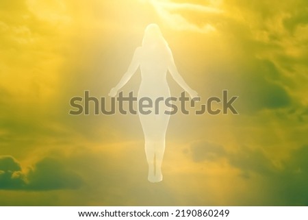 Ascension of the soul. The ghost of a woman ascends to heaven. Immortality, meditation, afterlife concept