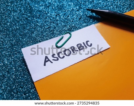 Ascorbic writting on blue background. 