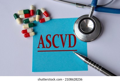 ASCVD (Atherosclerotic Cardiovascular Disease) - Medical Abbreviation On A Blue Sheet On The Background Of Tablets, Stethoscope And Pen. Medical Concept