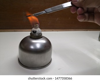 Aseptic Technique :The Forceps Was Burnt By Bunsen Burner.