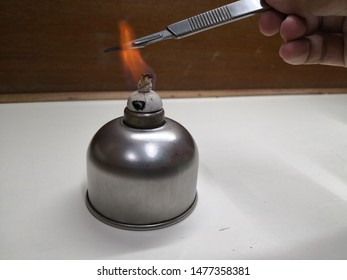 Aseptic Technique :The Forceps Was Burnt By Bunsen Burner.