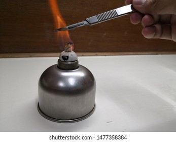 Aseptic Technique :The Forceps Was Burnt By Bunsen Burner.