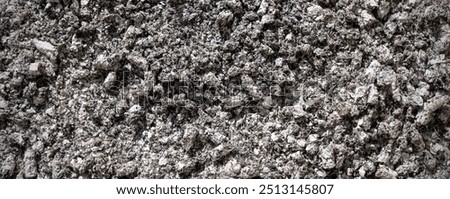 Ash close up as background. Cigarette ash texture top view
