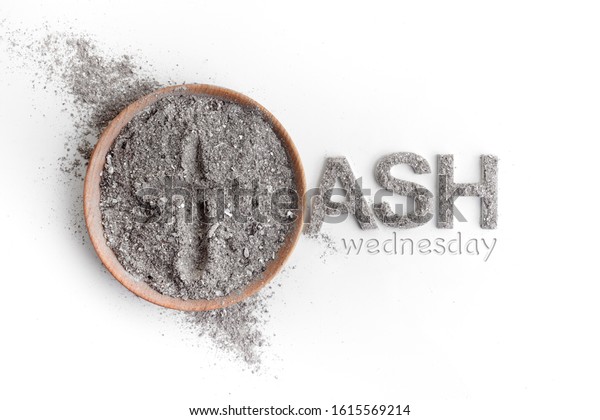 Ash wednesday, crucifix made of ash, dust as\
christian religion. Lent\
beginning