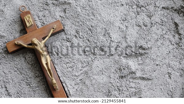 Ash Wednesday, crucifix made of ash, dust as\
Christian religion.
