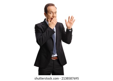 Ashamed businessman covering his mouth isolted on white background