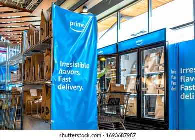 Ashburn, USA - February 2, 2020: Whole Foods Interior Inside In Virginia With Prime Now Fresh Delivery And Stocking Bags With Produce By Blue Sign