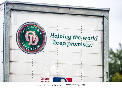 Ashburn, USA - October 5, 2021: Closeup Of Old Dominion Freight Line Truck Logo Sign Trailer Hauling Shipment On Interstate Highway In Georgia