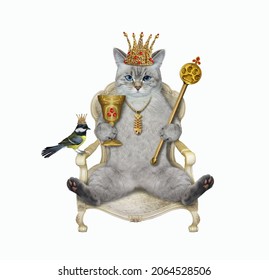 An ashen cat in a crown holds a scepter and a golden goblet on a throne. White background. Isolated. - Shutterstock ID 2064528506