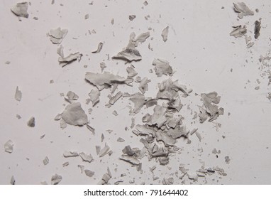 ashes of paper on a light background. background for the designer. burned paper.