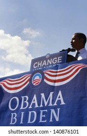 ASHEVILLE, NC - OCT. 5: Presidential Candidate Barack Obama Speaking At A Podium During A Campaign Rally At Asheville High School On October 5, 2008.