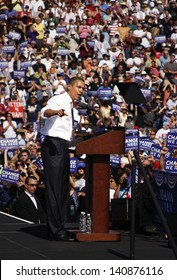 ASHEVILLE, NC - OCT. 5: Presidential Candidate Barack Obama Speaking At A Podium During A Campaign Rally At Asheville High School On October 5, 2008.