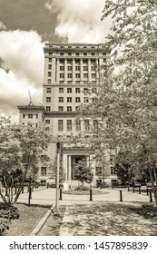 Asheville, NC / USA - May 11, 2019: Sepia toned photo of the Buncombe County courthouse in Asheville, NC on a beautiful spring day with blue skies and white clouds.