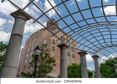 Asheville, NC/USA - May 11, 2019: Asheville City Hall, the center of the city's government, is an historic Art Deco brick and stone office building located on City-County Plaza in Asheville, NC.