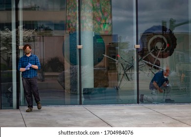 Asheville, North Carolina - 13 April 2020: Workers For The Asheville Art Museum Don Their PPE During The Covid-19 Pandemic And The Museum's Closing