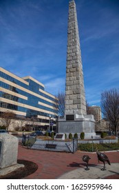 Asheville, North Carolina - 20 December 2019: Vance Monument recognizing Zebulon Vance in downtown Asheville with two bronze turkey statues nearby