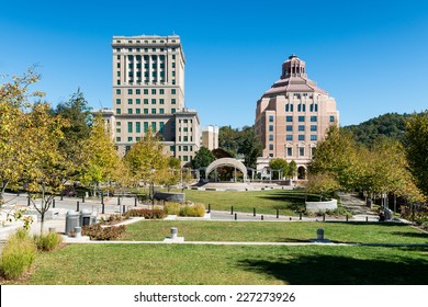ASHEVILLE, NORTH CAROLINA - OCTOBER 17: Buncombe County Courthouse (left) and the City Building (right) from Pack Square Park on October 17, 2014 in Asheville, North Carolina