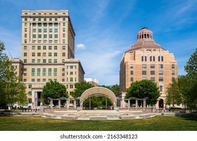 Asheville, North Carolina USA - May 5, 2022: Cityscape view of the municipal buildings in the downtown district of this popular small town visitor destination in the Blue Ridge mountains.