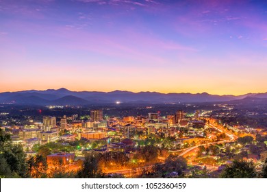 Asheville, North Carolina, USA skyline over downtown with the Blue Ridge Mountains.