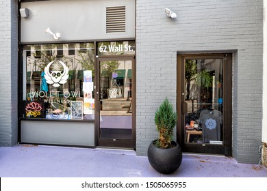 Asheville, USA - April 19, 2018: Violet Own Wellness Yoga Studio Entrance With Sign On Wall Street At Outdoor Shopping Mall Of Historic Old Town