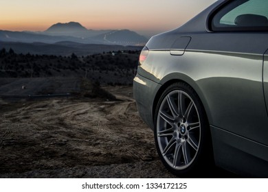 Ashgabad/Turkmenistan-01.09.2017: German BMW Car In The Evening On A Winding Mountain Road