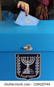 ASHKELON - FEB 10  2009: Israeli Person Votes At A Polling Station On Election Day In Ashkelon. Elections In Israel Are Based On Nationwide Proportional Representation.