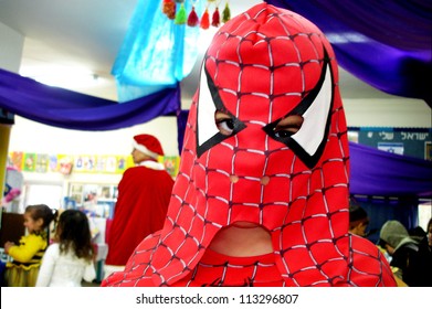 ASHKELON - MARCH 02 2007:Israeli Child Dressed Up With A Spiderman Costume During The Jewish Holiday Purim In Kindergarten In Ashkelon Israel.